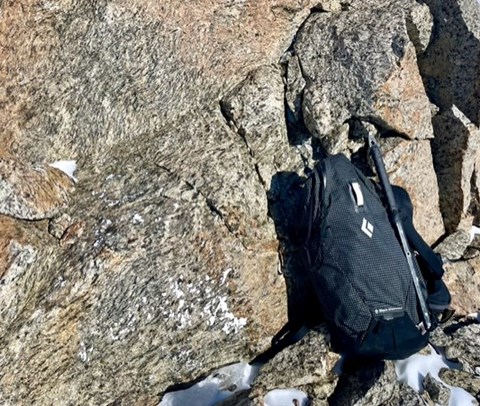 Backpack on a cliff
